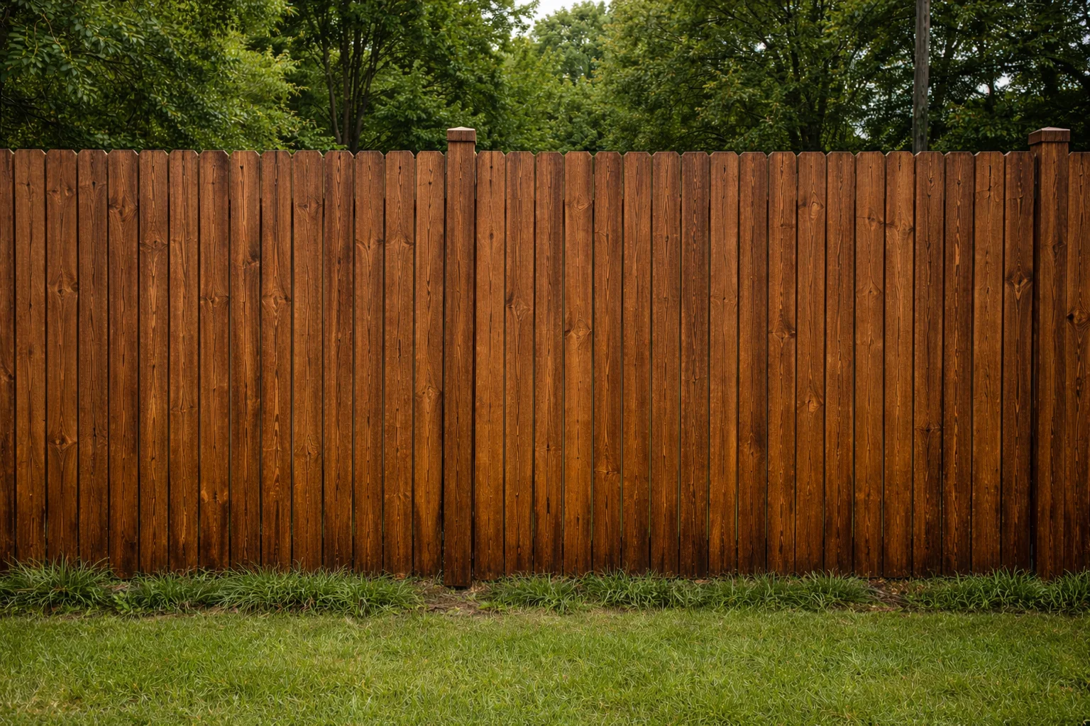 Twin Creeks cedar fence with honey gold stain finish